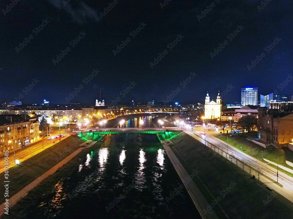 Gediminas' tower and Vilnius downtown at night. Drone footage.