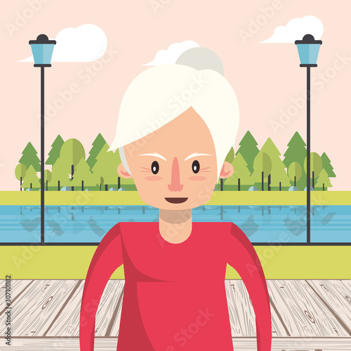 cute grandmother in the park landscape
