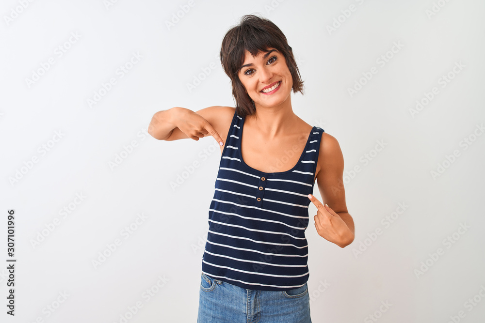 Young beautiful woman wearing striped t-shirt standing over isolated white background looking confident with smile on face, pointing oneself with fingers proud and happy. Young beautiful woman wearing striped t-shirt standing over isolated white background looking confident with smile on face, pointing oneself with fingers proud and happy.