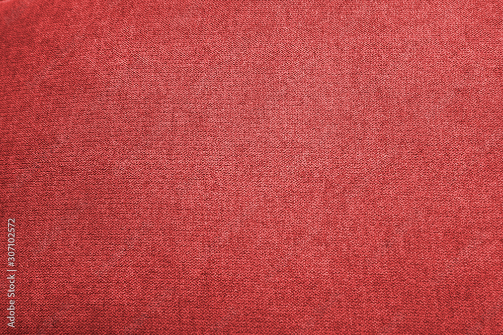 Fototapeta premium Closeup red color fabric sample texture backdrop. Fabric for decoration interior design or abstract background.