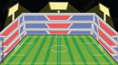 A football ground in flood lights