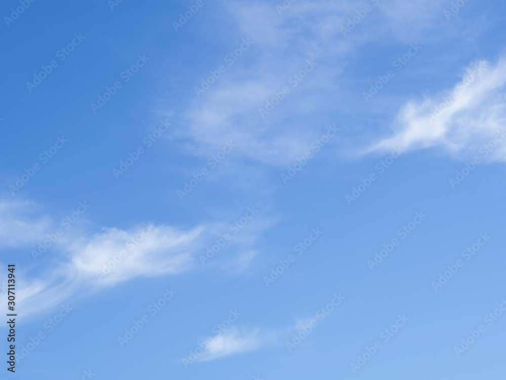 Blue sky with white fluffy clouds. Protecting the environment and the ozone layer of the Earth concept