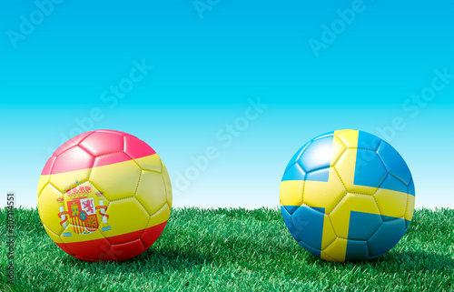 Two soccer balls in flags colors on green grass. Spain and Sweden. 3d image