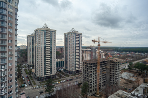 V. Chornovola street, city Brovary, country Ukraine -30.11.2019: city landscape. high-rise building construction.