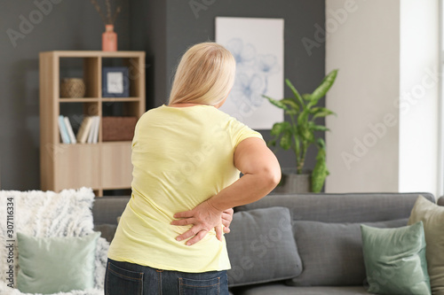 Mature woman suffering from...