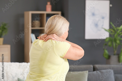 Mature woman suffering from...