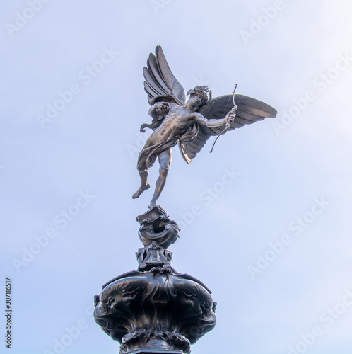 Shaftesbury Memorial Fountain also known as Eros, is a fountain surmounted by a winged statue of Anteros, located at the southeastern side of Piccadilly Circus in London photo