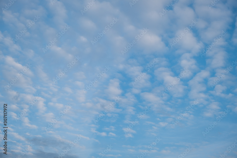 Blue sky with clouds. Background with blue sky and clouds