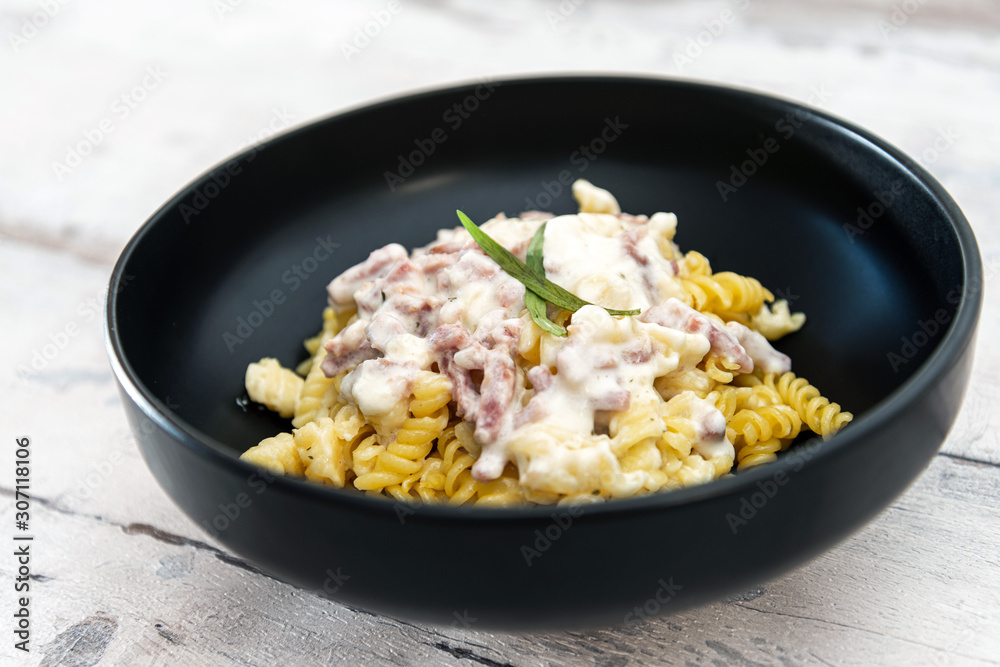 tasty Carbonara pasta on the table