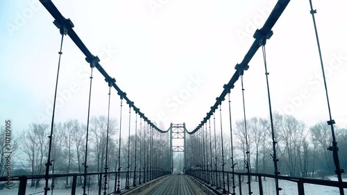 bridge over katun river in altay, russia photo