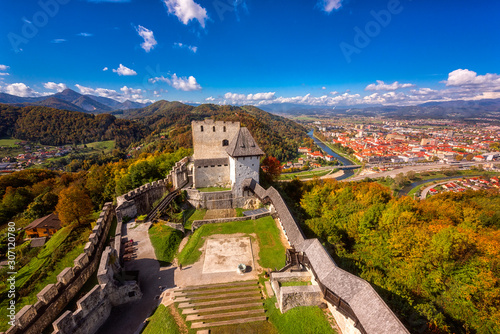 Celje Old castle (Celjski Stari grad), amazing aerial view of medieval fortification and town of Celje in Lasko valley in Julian Alps mountains, Slovenia, Styria. Outdoor travel background photo