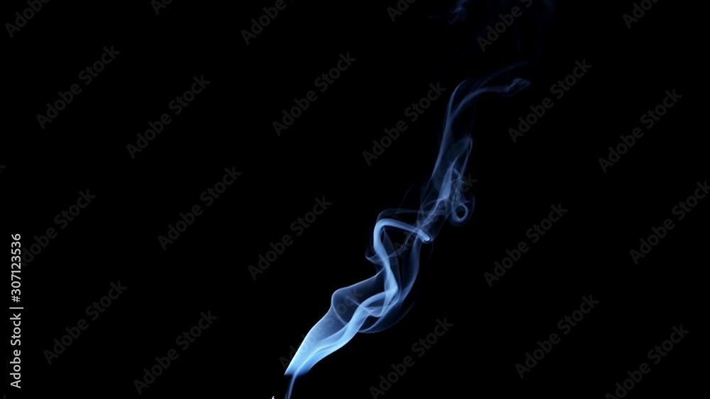 Thin Flexible Trickle of Smoke. Graceful Bends of the Blue Smoke. Natural Colorful smoke rises up and spins into graceful spirals. Footage is perfect for the layer with different blending modes. Thin Flexible Trickle of Smoke. Graceful Bends of the Blue Smoke. Natural Colorful smoke rises up and spins into graceful spirals. Footage is perfect for the layer with different blending modes.