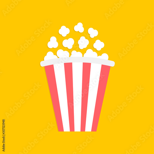 Popcorn. Big red white strip box. Cinema movie night icon. Pop corn food. Flat design style. Yellow background. Isolated.