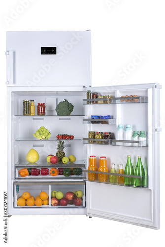 Open fridge full of fresh fruits and vegetables