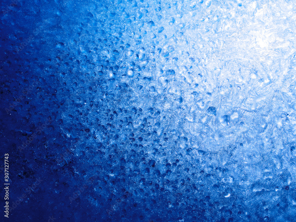 Obraz premium Under the ice! An ice surface with melted droplets and incredible details.