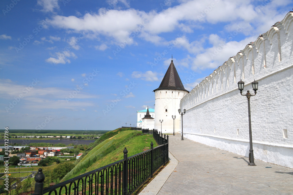 White fortress wall of the ancient Russian Kremlin in the Siberian city of Tobolsk