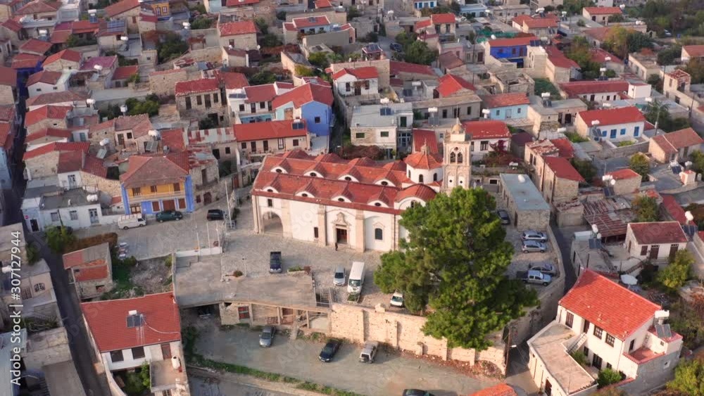 Aerial view of Pano Lefkara village in Larnaca district, Cyprus. Famous old village in mountains with orange roofs Aerial view of Pano Lefkara village in Larnaca district, Cyprus. Famous old village in mountains with orange roofs