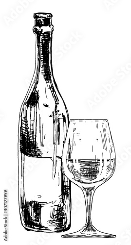 Bottle of wine with glass