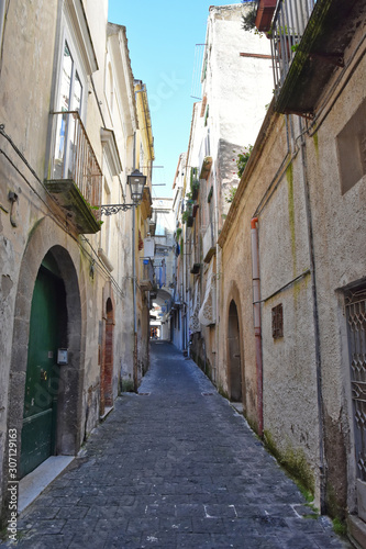Sessa Aurunca, Italy, 11/30/2019. A small street among the old houses of a medieval village in the province of Caserta © Giambattista