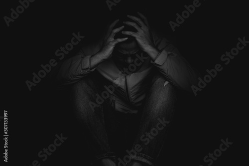 panic attacks alone young man sad fear stressful depressed emotion.crying begging help.stop abusing domestic violence,person with health anxiety,people bad frustrated exhausted feeling down photo