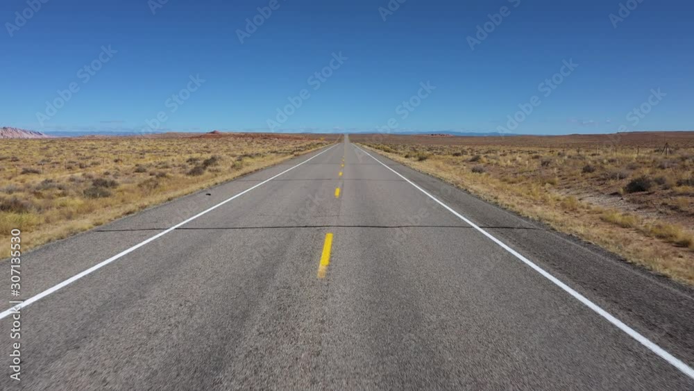 Driving On An Empty Highway Passing Through The Hot Desert Steppe Aerial View Driving On An Empty Highway Passing Through The Hot Desert Steppe Aerial View