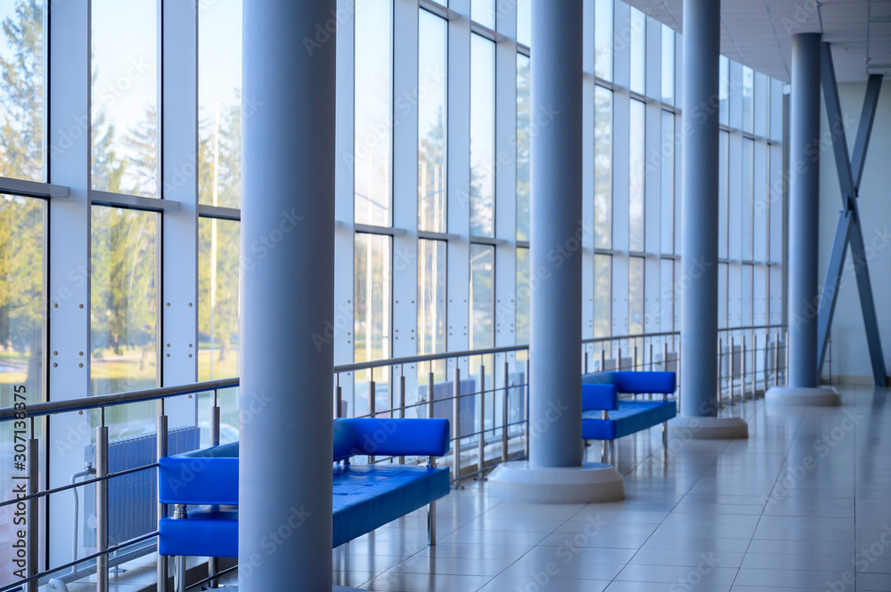 Interior concept of a modern urban building. Photo of the lobby of a public building. Interior concept of a modern urban building. Photo of the lobby of a public building.