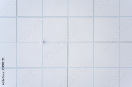 Squared background concept in white. Photo of the ceiling in the building.