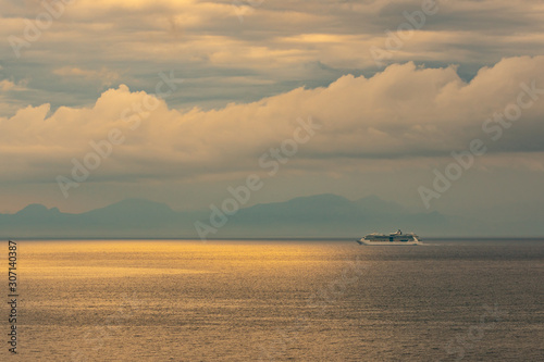 Distant view of touristic ship in the mediterranean sea. Travel.