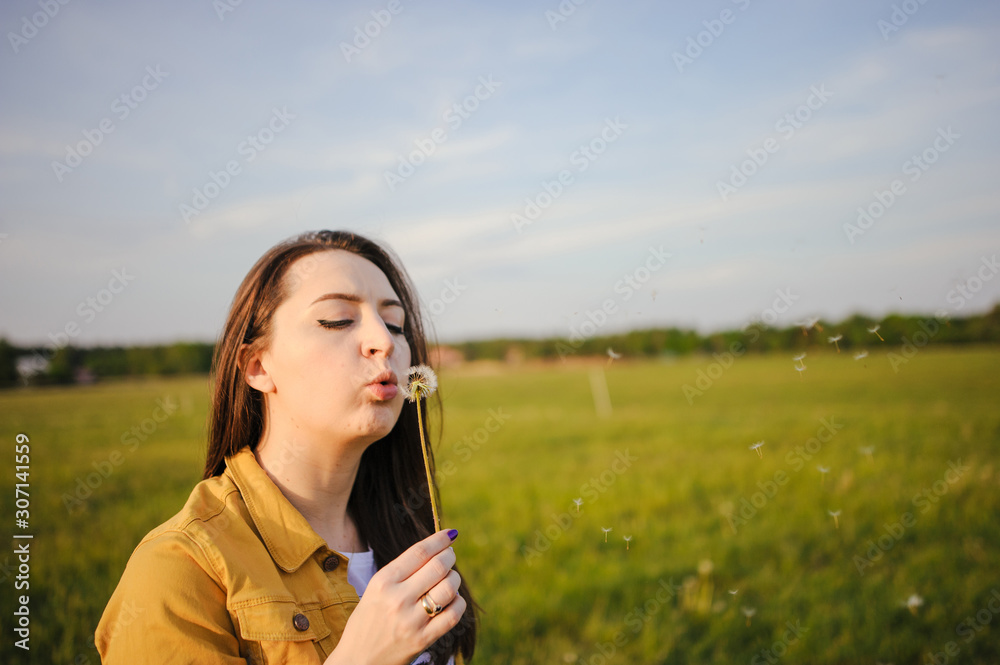 Happy young girl enjoying the beauty of sunny spring day Happy young girl enjoying the beauty of sunny spring day