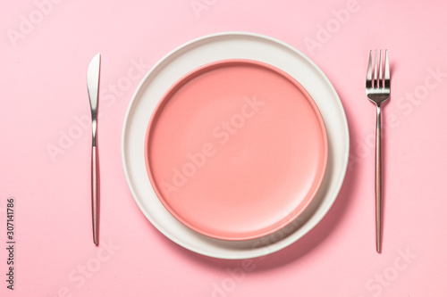 Table setting on pink top view.