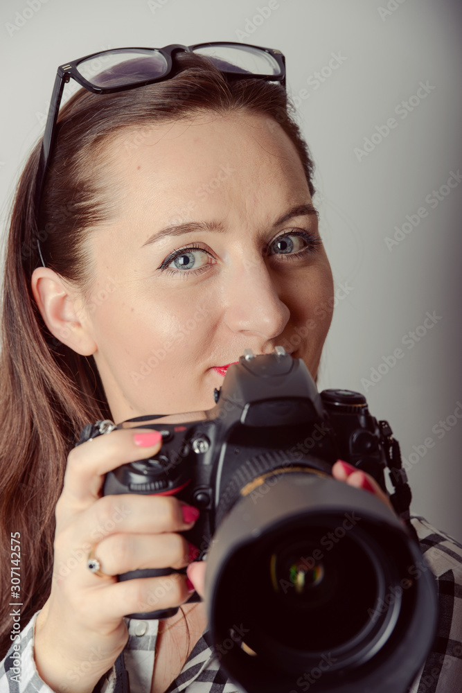 Woman-photographer takes images, Woman-photographer takes images,