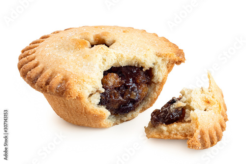 Broken open traditional british christmas mince pie with fruit filling isolated on white.