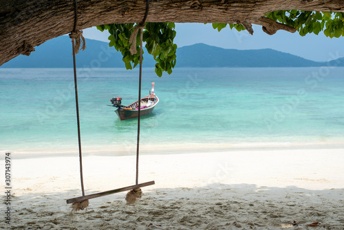 Swing on the beach during summer day on the beach © Songwut Pinyo