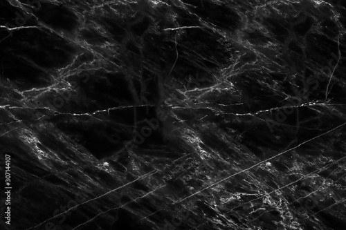 white pattern of black marble texture for interior or product design. Abstract dark background.