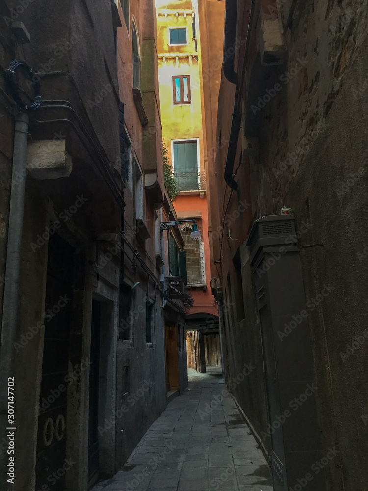 Cozy little narrow and shaded alley of Venice