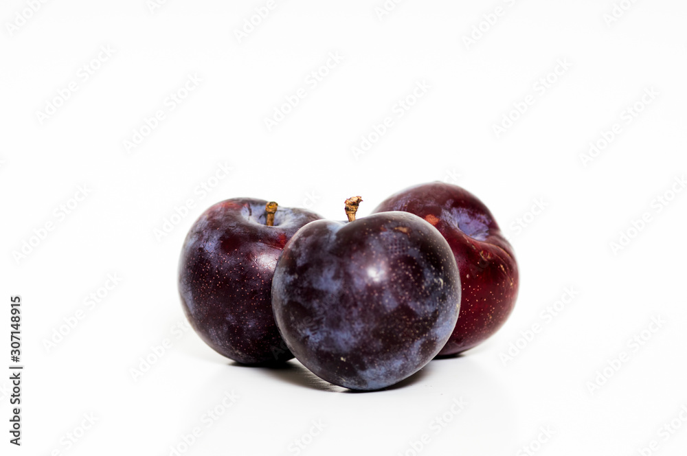 Red cherry plum on white background