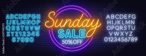 Sunday sale neon sign on dark background. Neon alphabet on a dark background. Template for design.