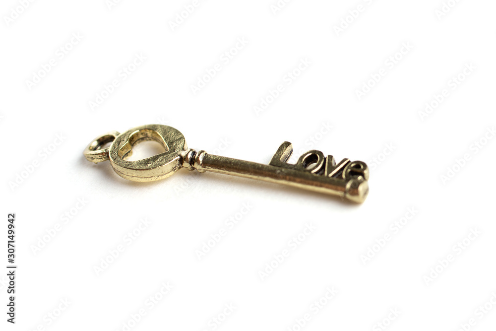 gold key with love isolated on white background. gold key with love isolated on white background.