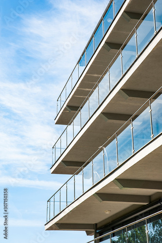 Modern luxury apartment building with big terraces