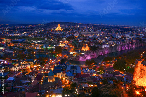Tbilisi, Georgia The city at dusk and the Holy Trinity Cathedral of Tbilisi in the background. © Alexander