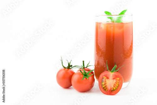 Red fresh tomatoes juice isolated on white background