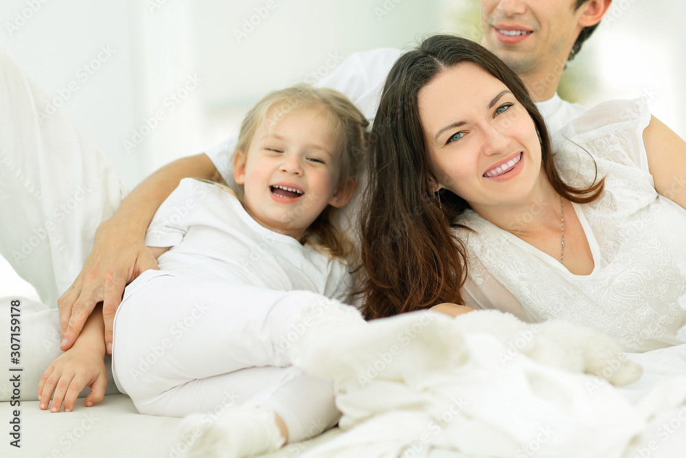 background image of a happy young family