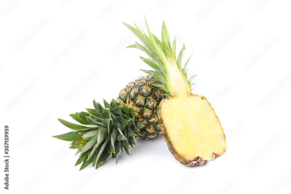 Whole and half pineapple isolated on white background. Juicy fruit Whole and half pineapple isolated on white background. Juicy fruit