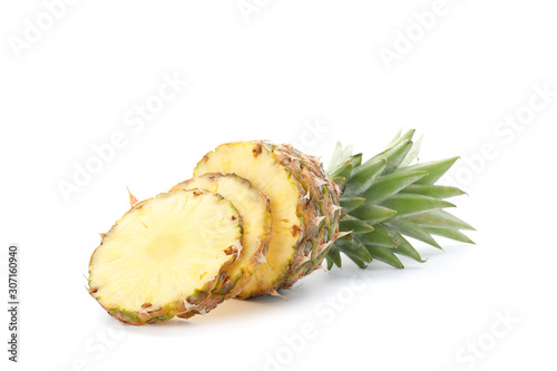 Cutted pineapple and slices isolated on white background