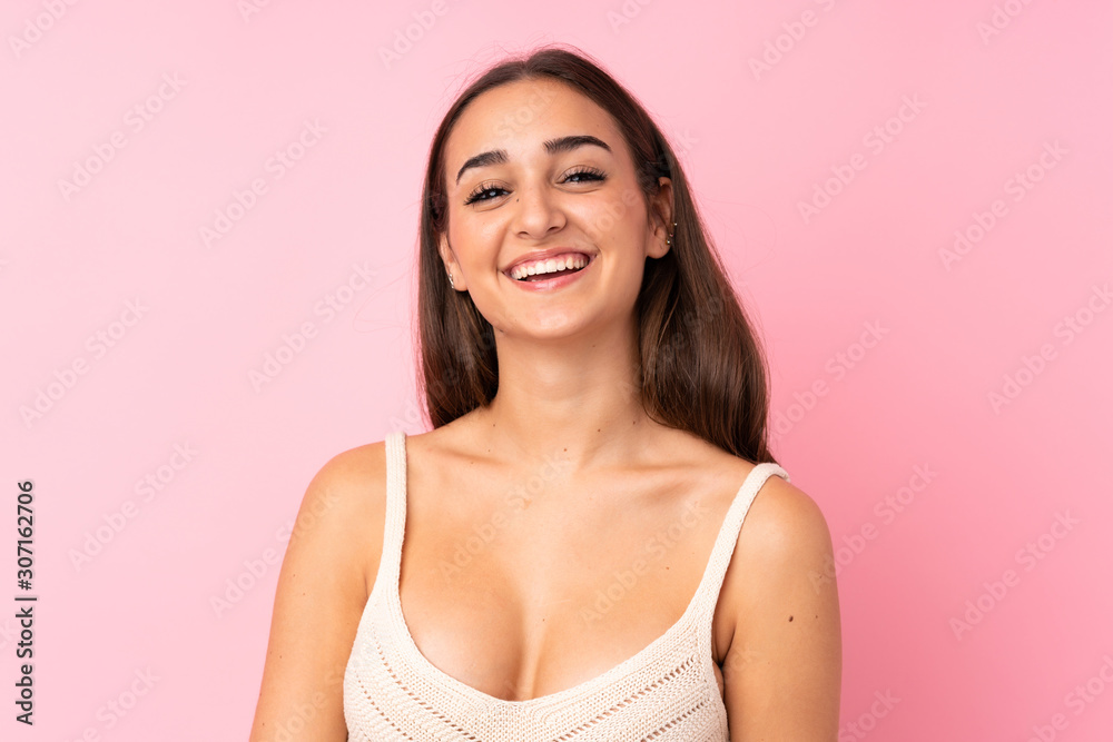Portrait of beautiful girl over isolated pink background Portrait of beautiful girl over isolated pink background