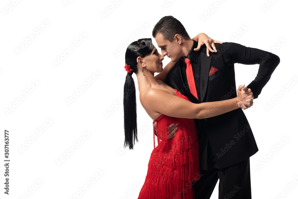 passionate, elegant dancers performing tango isolated on white passionate, elegant dancers performing tango isolated on white