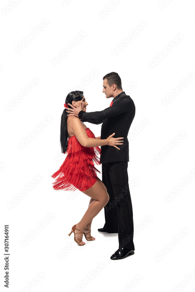 passionate couple of dancers performing tango on white background passionate couple of dancers performing tango on white background