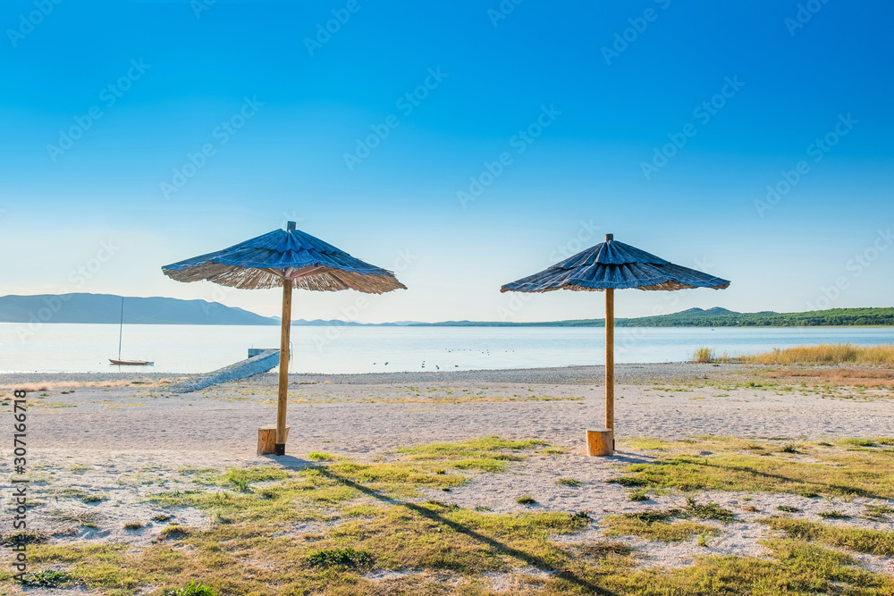 Croatia, beautiful beach on lake shore in nature park Vransko Jezero in Dalmatia