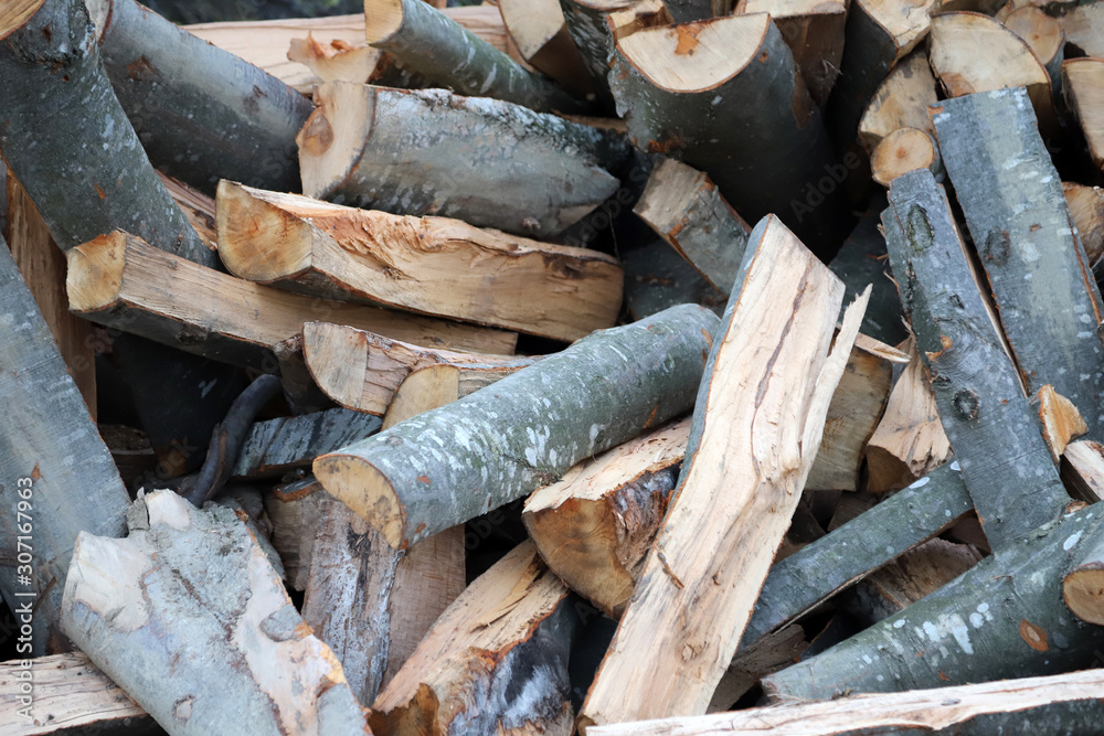Freshly cutted chopped firewood Freshly cutted chopped firewood