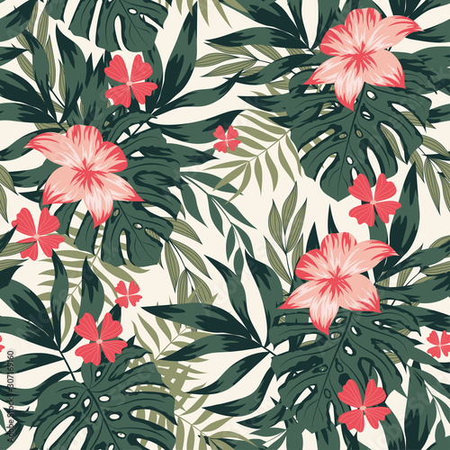 Seamless pattern with tropical leaves and flowers. Exotic wallpaper  Hawaiian style. Jungle leaves vector floral pattern background. Botanical pattern. Trendy hand drawn textures.